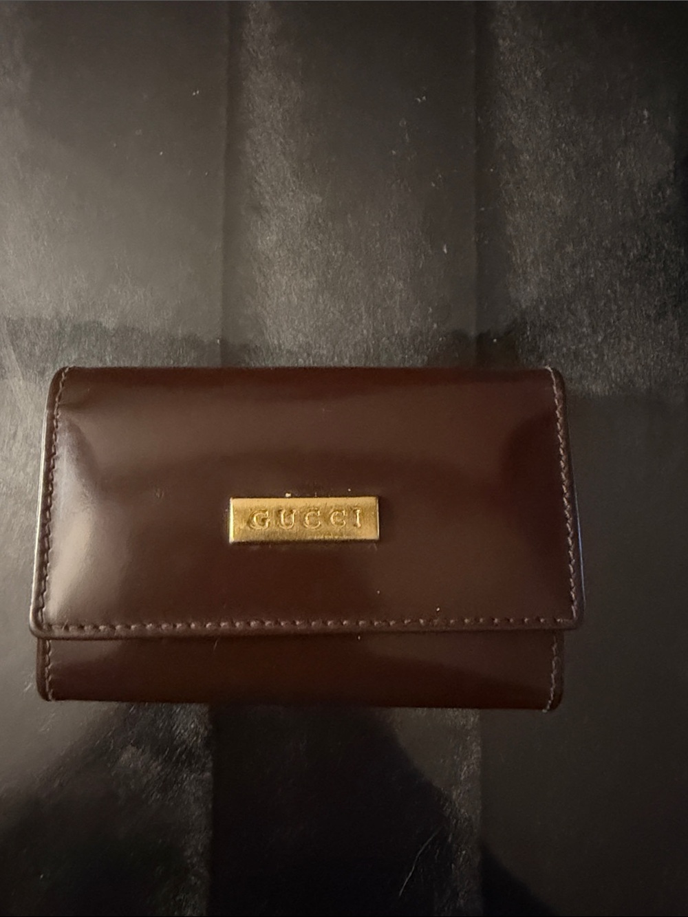 Gucci Brown Leather Trifold Wallet with Gold Plaque